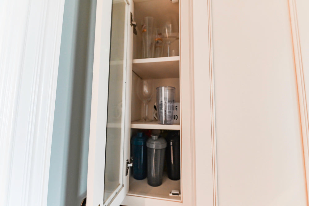 Omega Traditional Light Cream Butler's Pantry with Granite Countertops