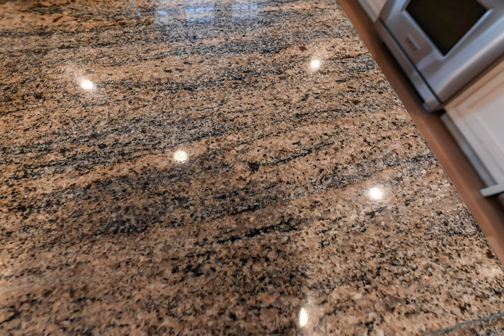 Omega Traditional Light Cream Butler's Pantry with Granite Countertops