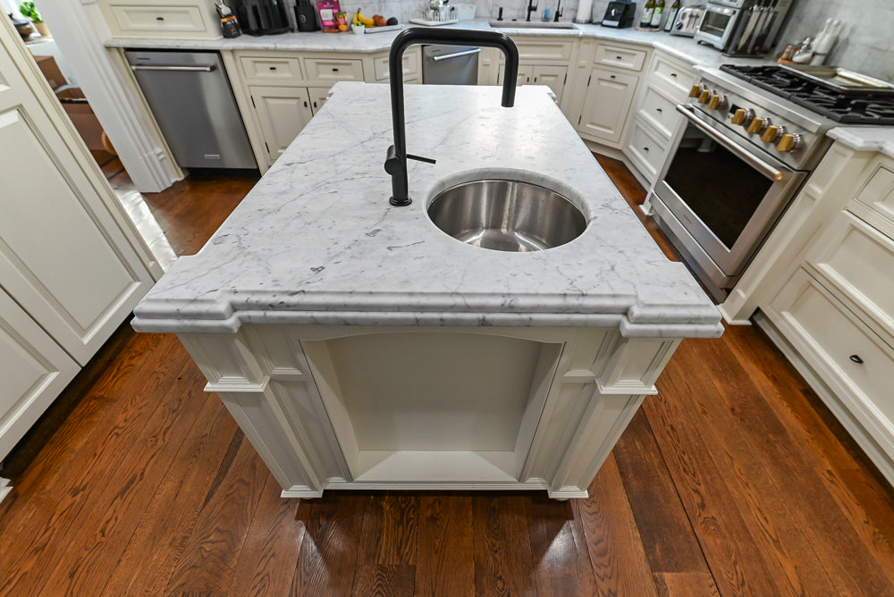 Traditional Creamy White Kitchen with Island, Marble Countertops and Appliances