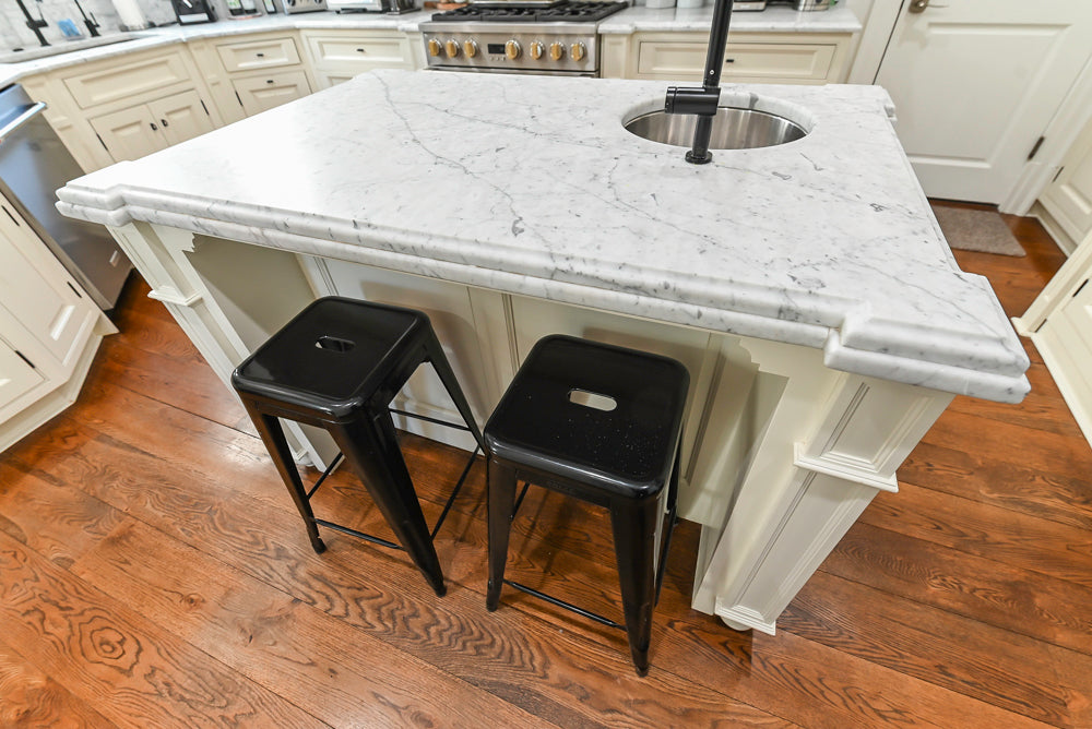 Traditional Creamy White Kitchen with Island, Marble Countertops and Appliances