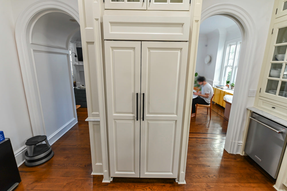Traditional Creamy White Kitchen with Island, Marble Countertops and Appliances