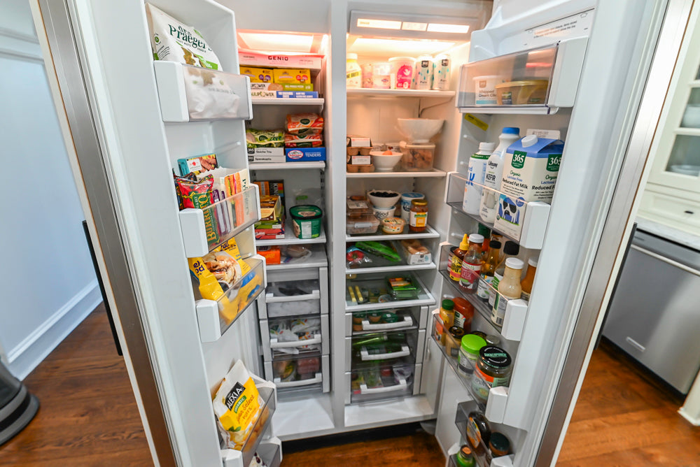Traditional Creamy White Kitchen with Island, Marble Countertops and Appliances