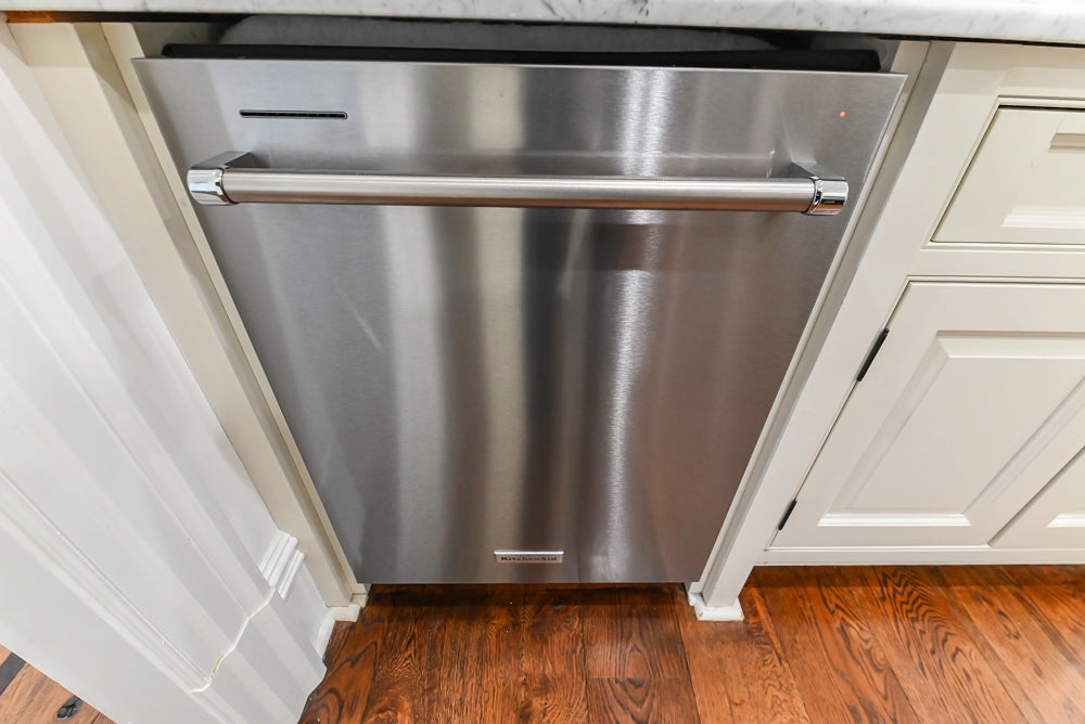 Traditional Creamy White Kitchen with Island, Marble Countertops and Appliances