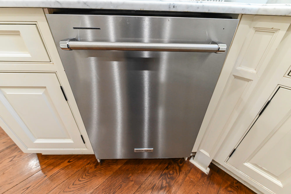 Traditional Creamy White Kitchen with Island, Marble Countertops and Appliances