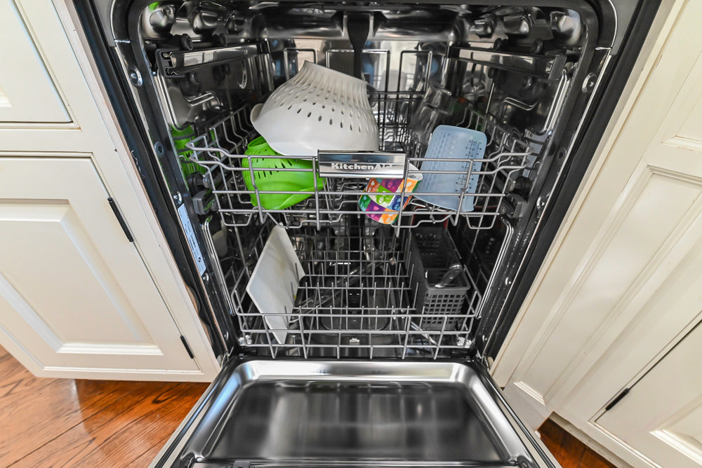 Traditional Creamy White Kitchen with Island, Marble Countertops and Appliances