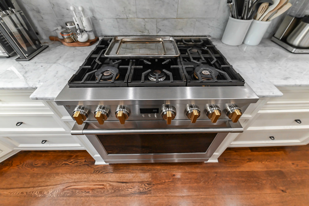 Traditional Creamy White Kitchen with Island, Marble Countertops and Appliances