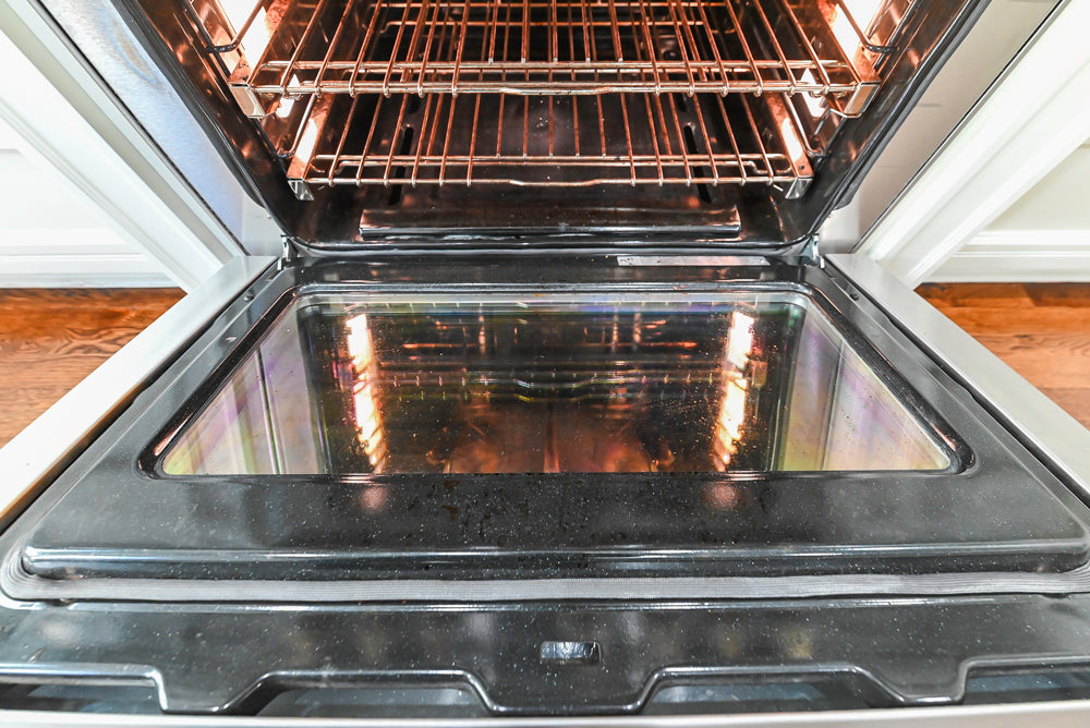 Traditional Creamy White Kitchen with Island, Marble Countertops and Appliances
