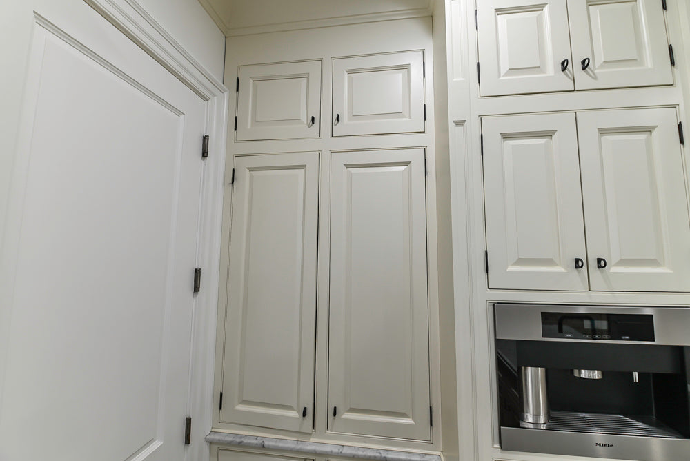 Traditional Creamy White Kitchen with Island, Marble Countertops and Appliances