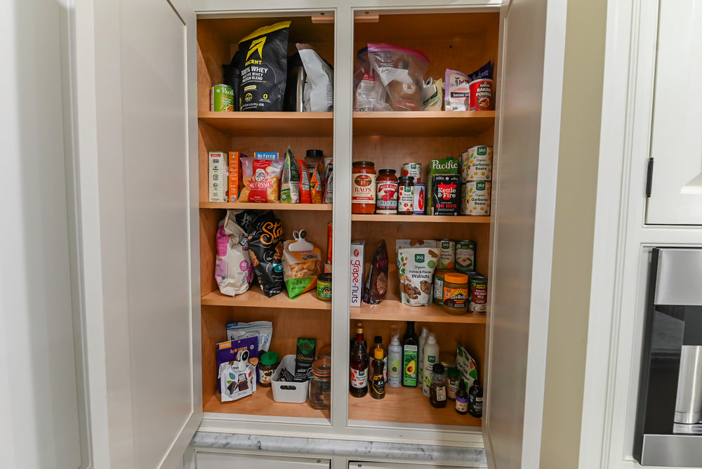 Traditional Creamy White Kitchen with Island, Marble Countertops and Appliances