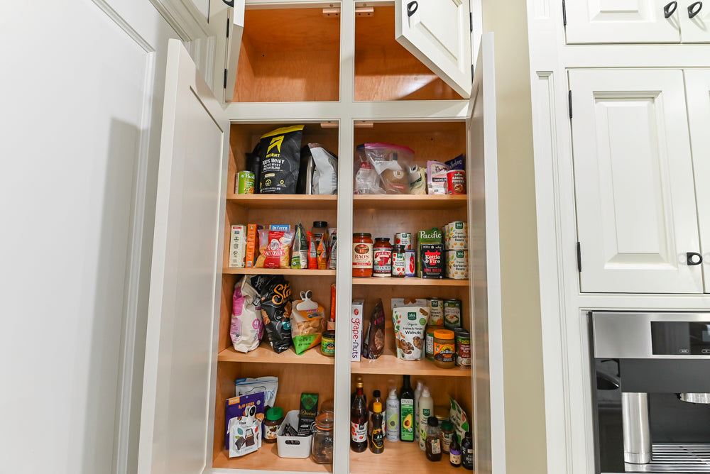 Traditional Creamy White Kitchen with Island, Marble Countertops and Appliances