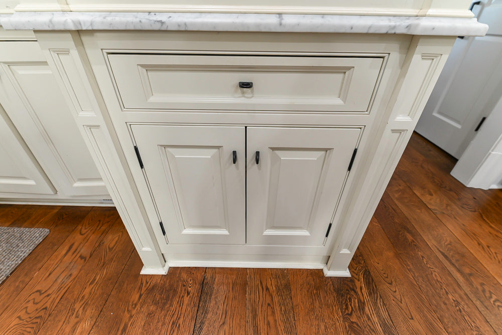 Traditional Creamy White Kitchen with Island, Marble Countertops and Appliances