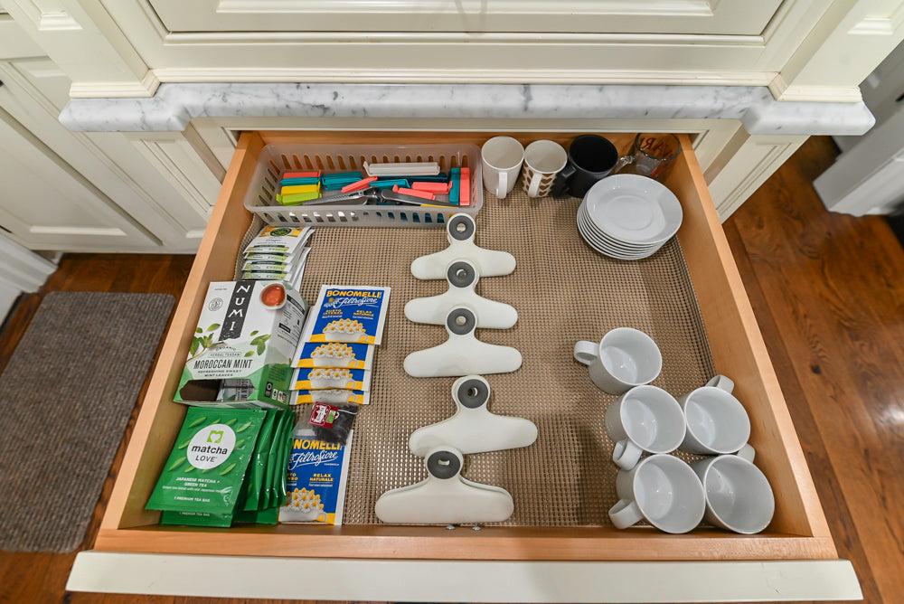 Traditional Creamy White Kitchen with Island, Marble Countertops and Appliances