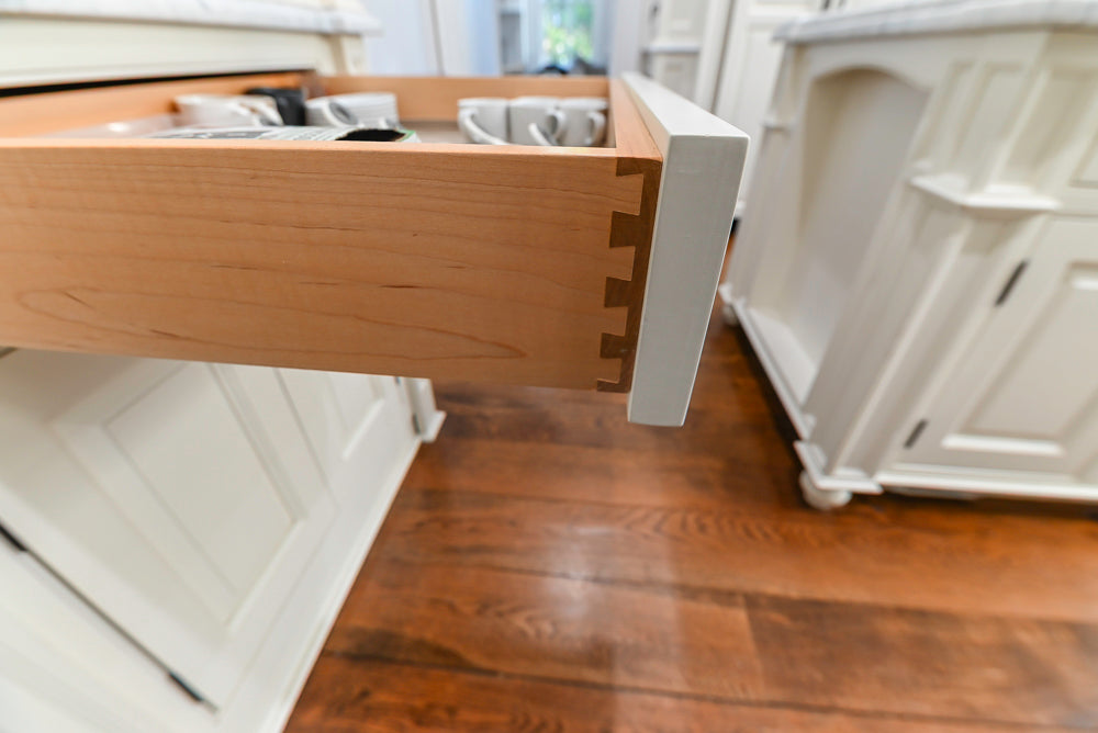Traditional Creamy White Kitchen with Island, Marble Countertops and Appliances