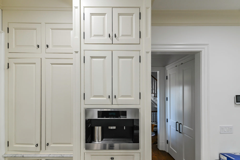 Traditional Creamy White Kitchen with Island, Marble Countertops and Appliances