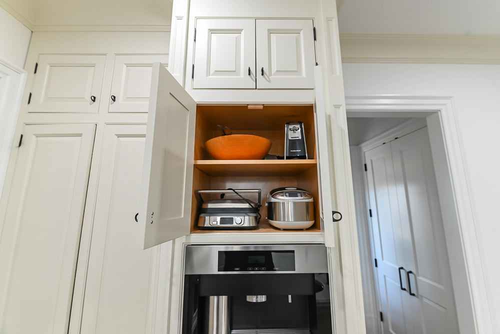 Traditional Creamy White Kitchen with Island, Marble Countertops and Appliances
