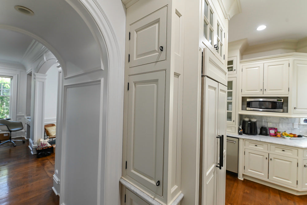 Traditional Creamy White Kitchen with Island, Marble Countertops and Appliances