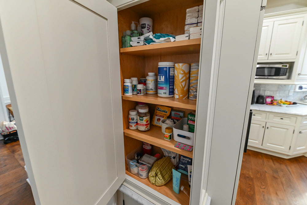 Traditional Creamy White Kitchen with Island, Marble Countertops and Appliances