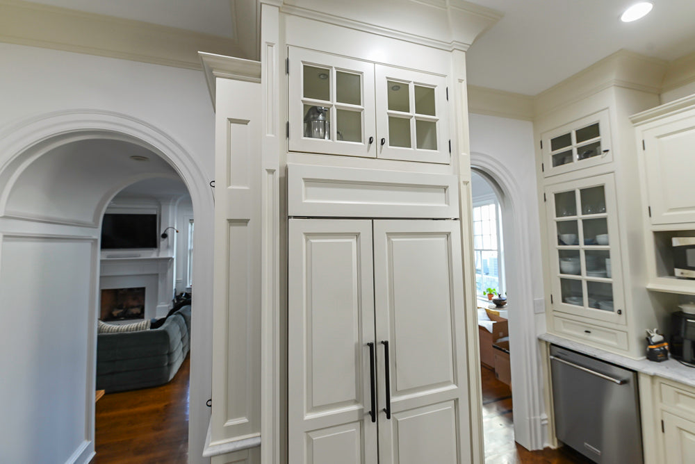 Traditional Creamy White Kitchen with Island, Marble Countertops and Appliances