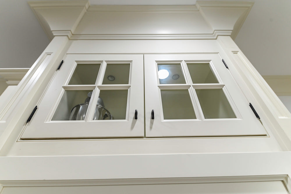 Traditional Creamy White Kitchen with Island, Marble Countertops and Appliances