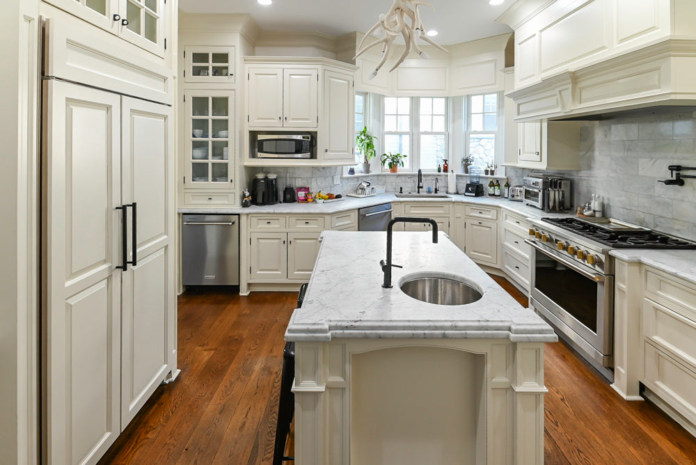 Traditional Creamy White Kitchen with Island, Marble Countertops and Appliances