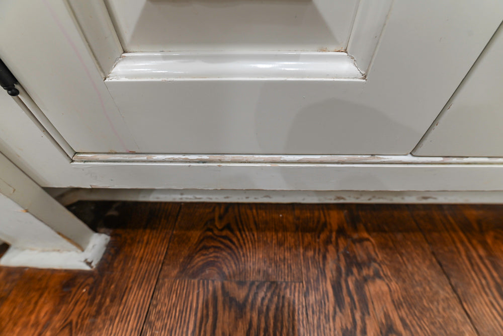 Traditional Creamy White Kitchen with Island, Marble Countertops and Appliances