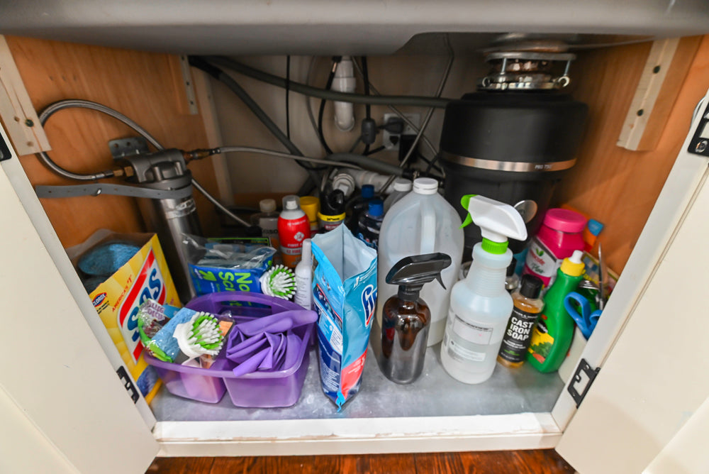 Traditional Creamy White Kitchen with Island, Marble Countertops and Appliances