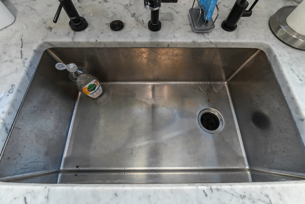 Traditional Creamy White Kitchen with Island, Marble Countertops and Appliances