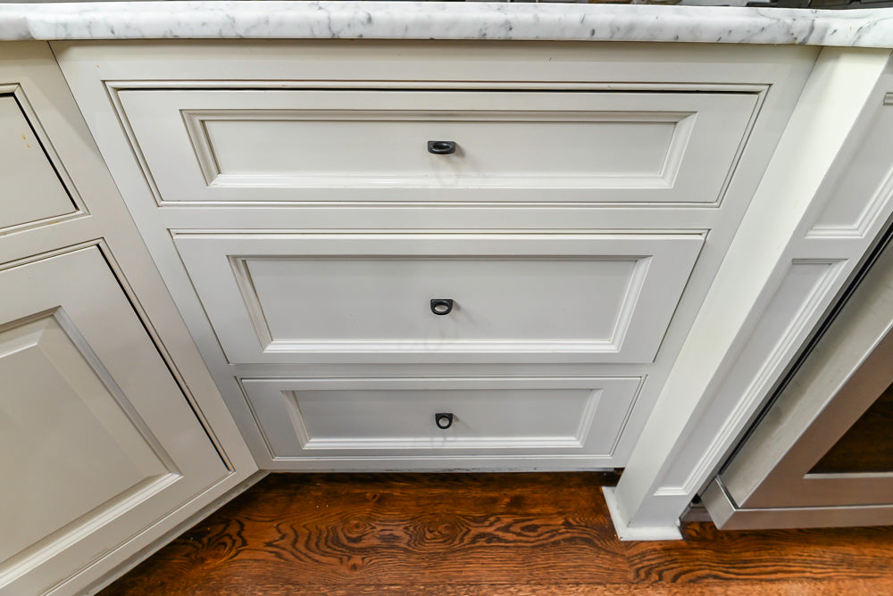 Traditional Creamy White Kitchen with Island, Marble Countertops and Appliances