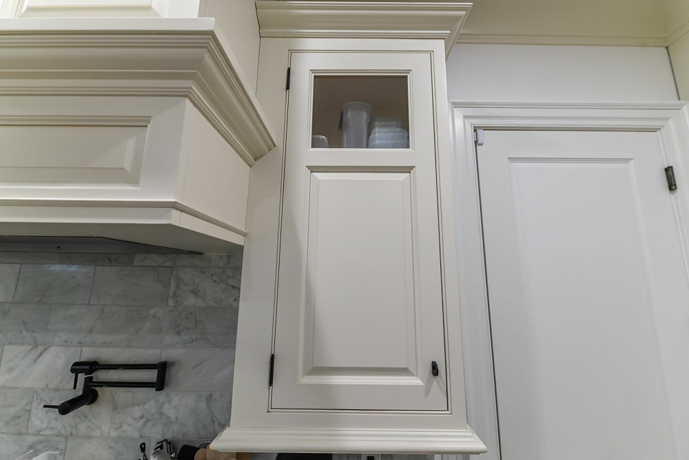 Traditional Creamy White Kitchen with Island, Marble Countertops and Appliances