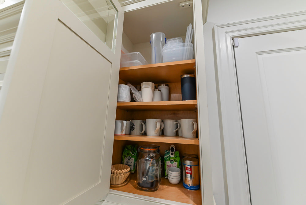 Traditional Creamy White Kitchen with Island, Marble Countertops and Appliances