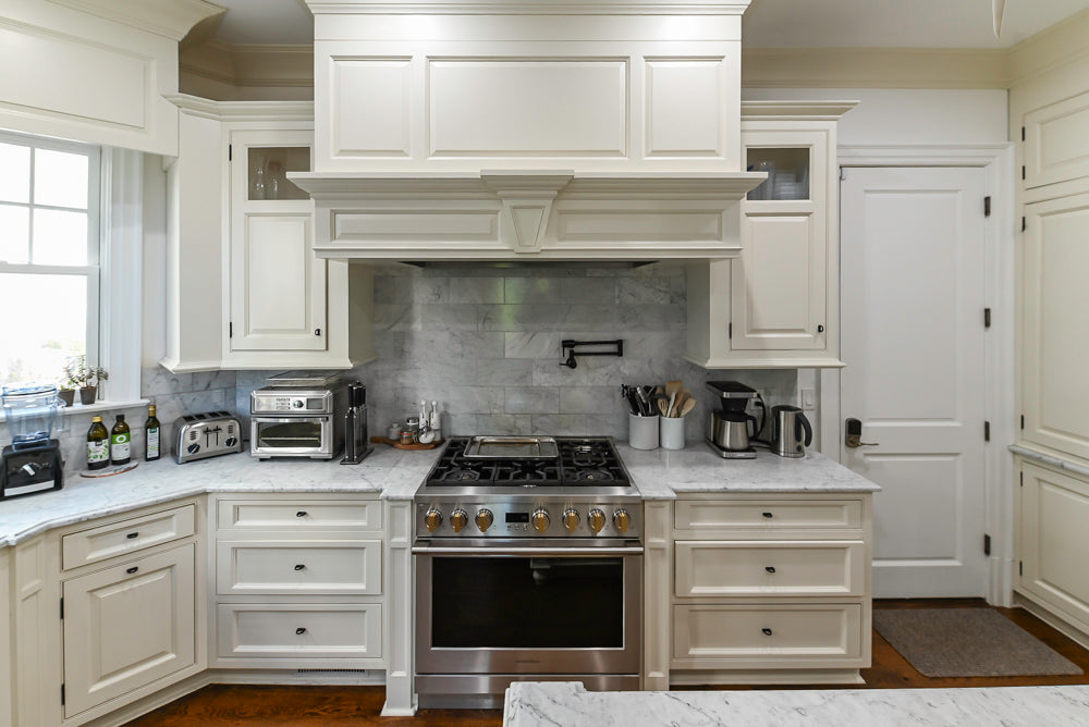 Traditional Creamy White Kitchen with Island, Marble Countertops and Appliances