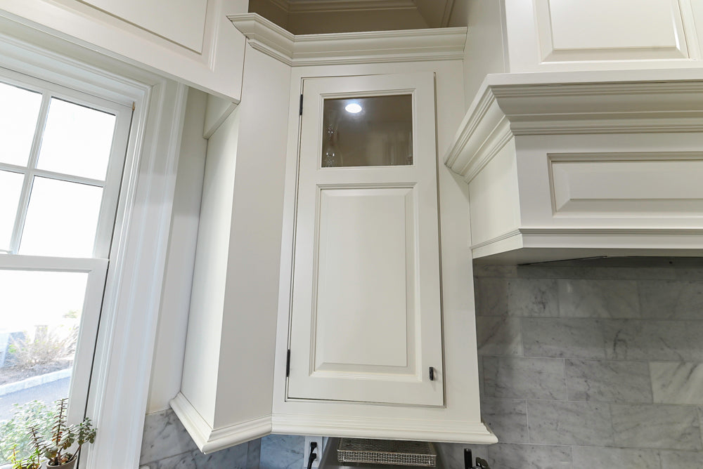 Traditional Creamy White Kitchen with Island, Marble Countertops and Appliances