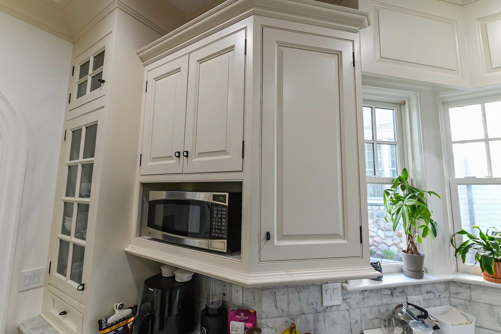 Traditional Creamy White Kitchen with Island, Marble Countertops and Appliances