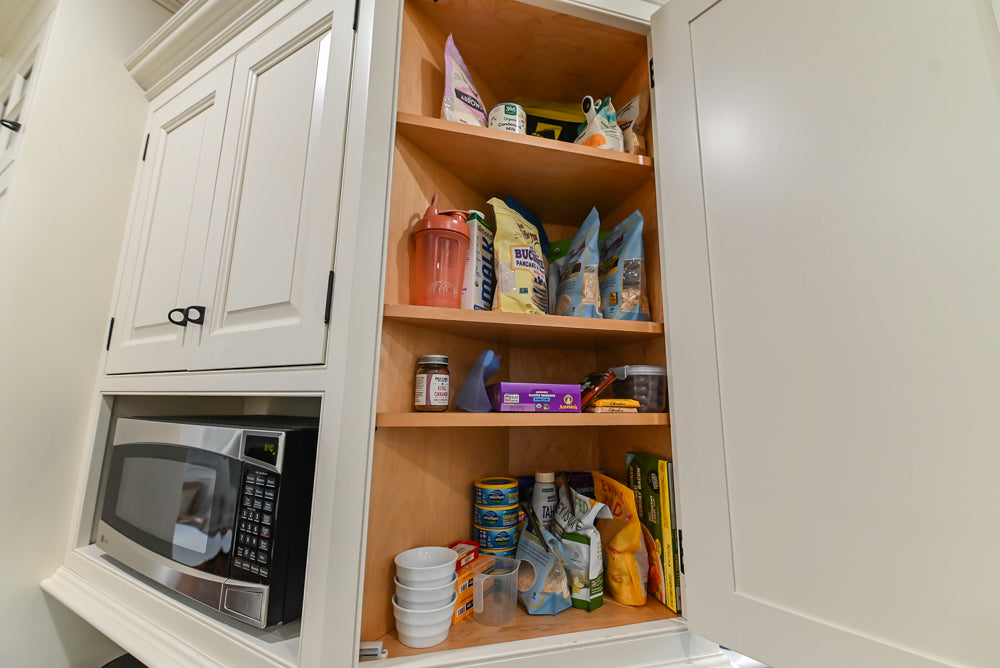 Traditional Creamy White Kitchen with Island, Marble Countertops and Appliances