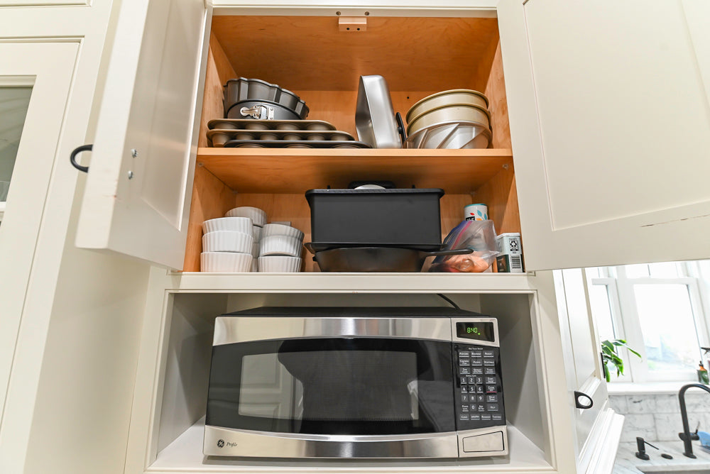 Traditional Creamy White Kitchen with Island, Marble Countertops and Appliances
