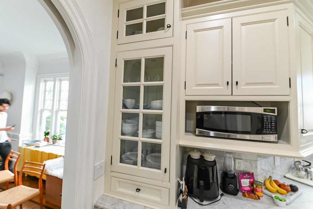 Traditional Creamy White Kitchen with Island, Marble Countertops and Appliances