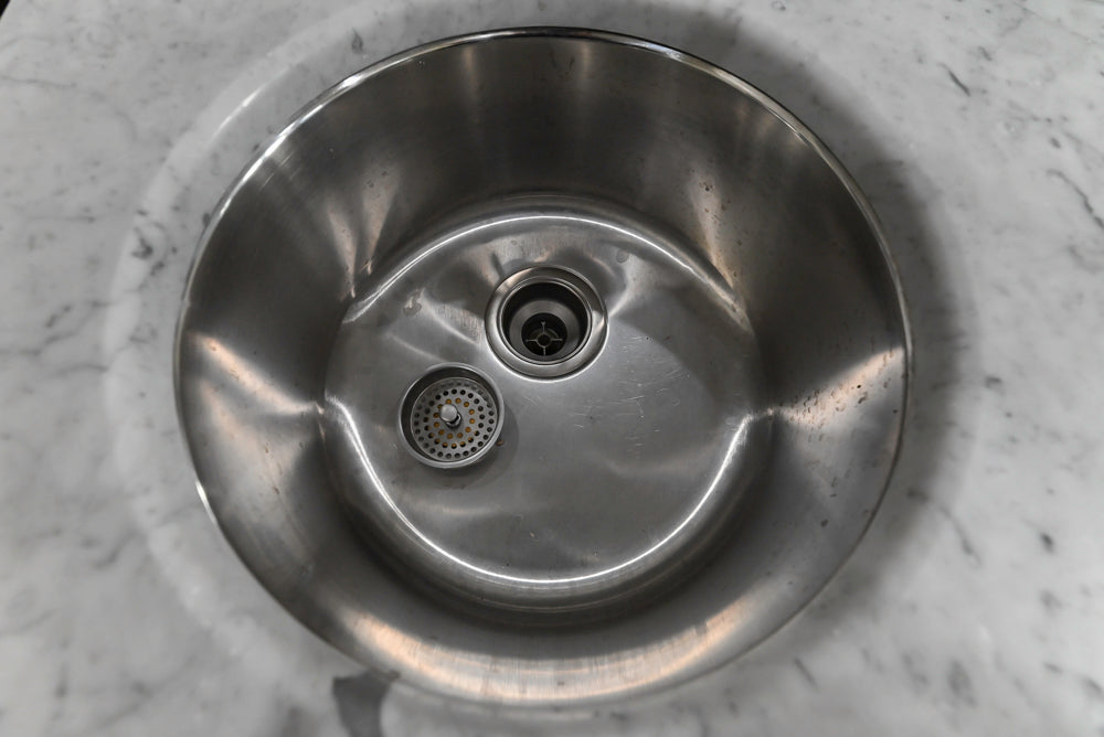 Traditional Creamy White Kitchen with Island, Marble Countertops and Appliances