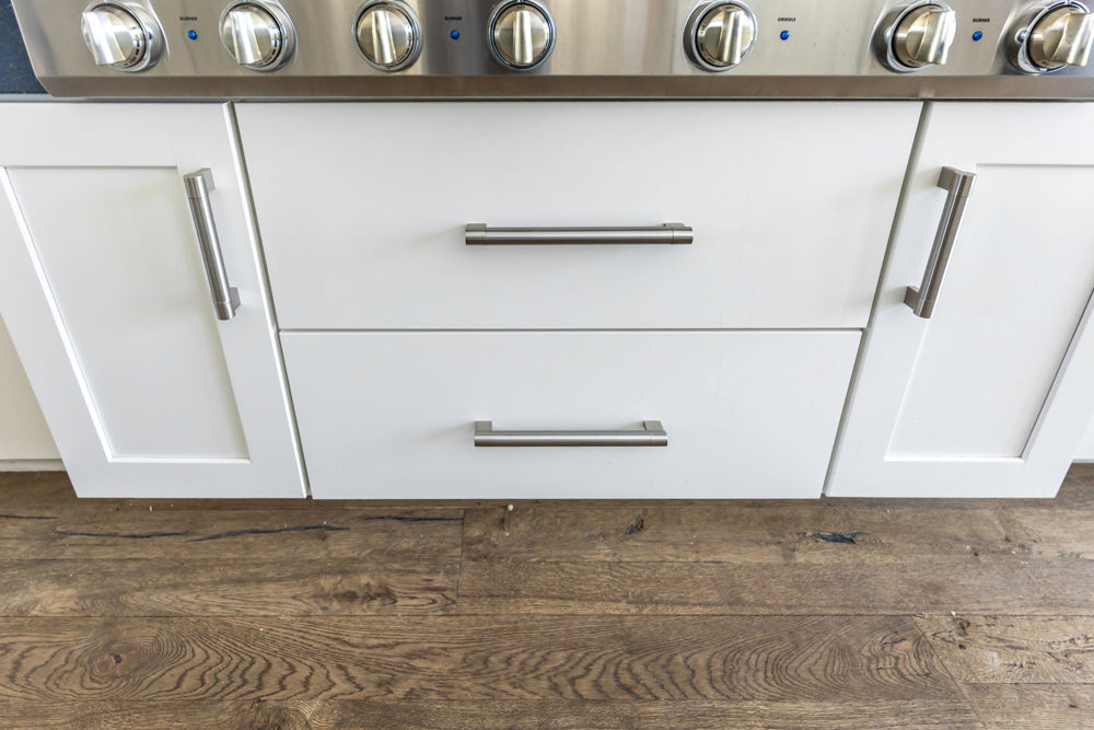 Transitional White Kitchen with Marble Waterfall Island and Thermador Appliances