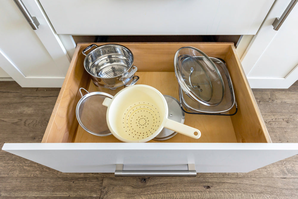 Transitional White Kitchen with Marble Waterfall Island and Thermador Appliances