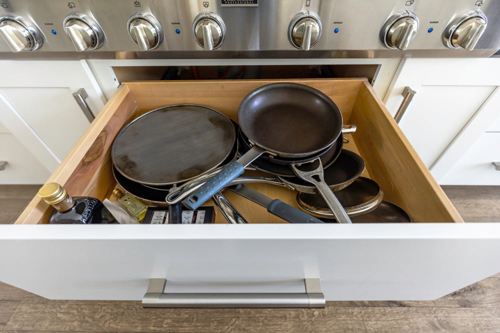 Transitional White Kitchen with Marble Waterfall Island and Thermador Appliances