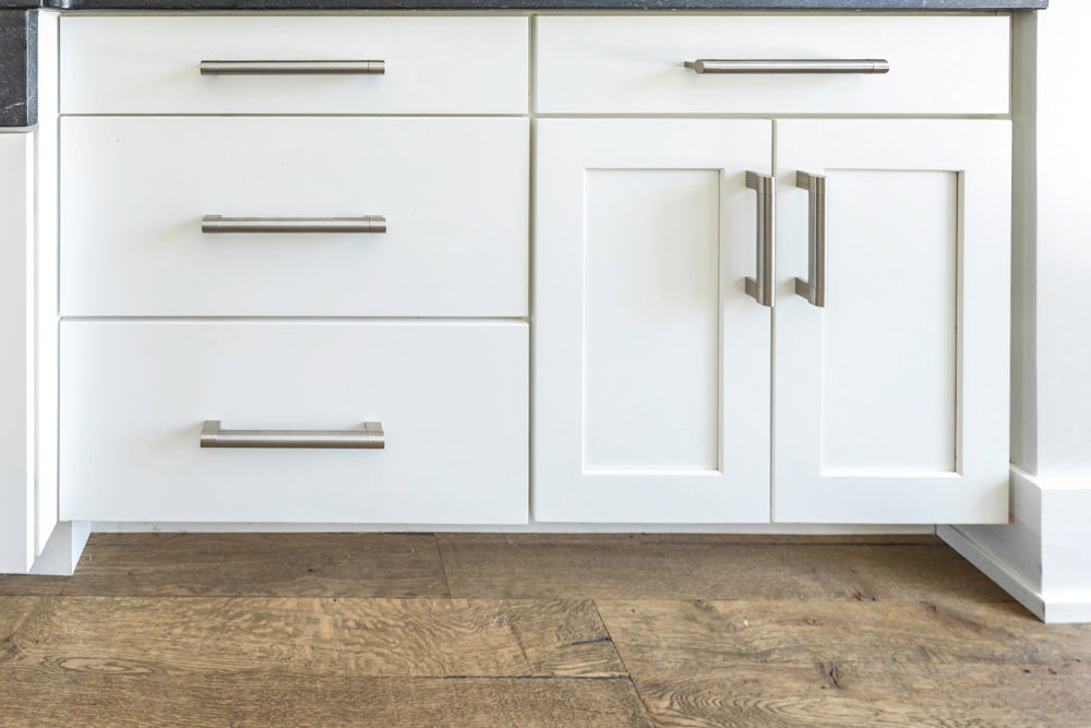 Transitional White Kitchen with Marble Waterfall Island and Thermador Appliances
