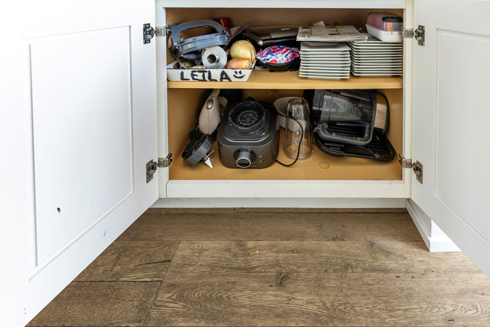 Transitional White Kitchen with Marble Waterfall Island and Thermador Appliances