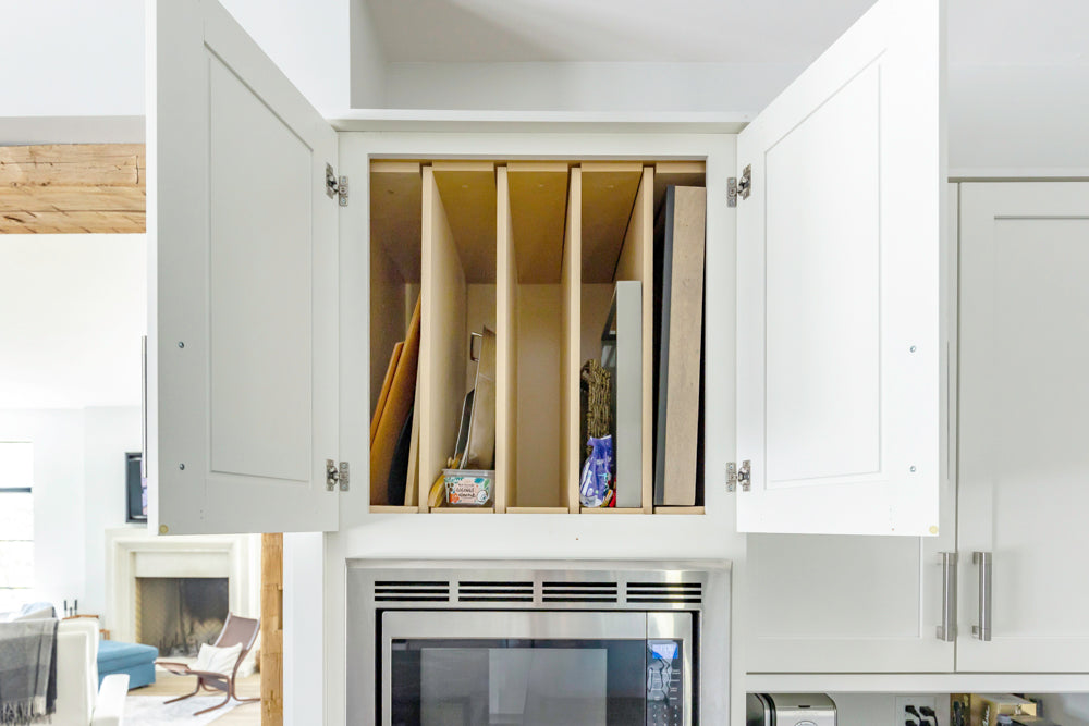 Transitional White Kitchen with Marble Waterfall Island and Thermador Appliances