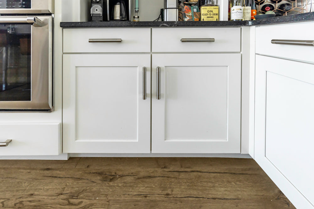 Transitional White Kitchen with Marble Waterfall Island and Thermador Appliances