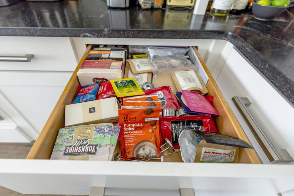 Transitional White Kitchen with Marble Waterfall Island and Thermador Appliances