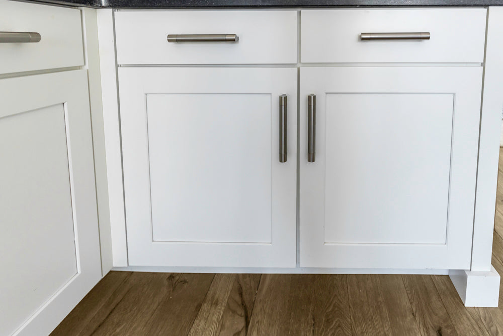 Transitional White Kitchen with Marble Waterfall Island and Thermador Appliances