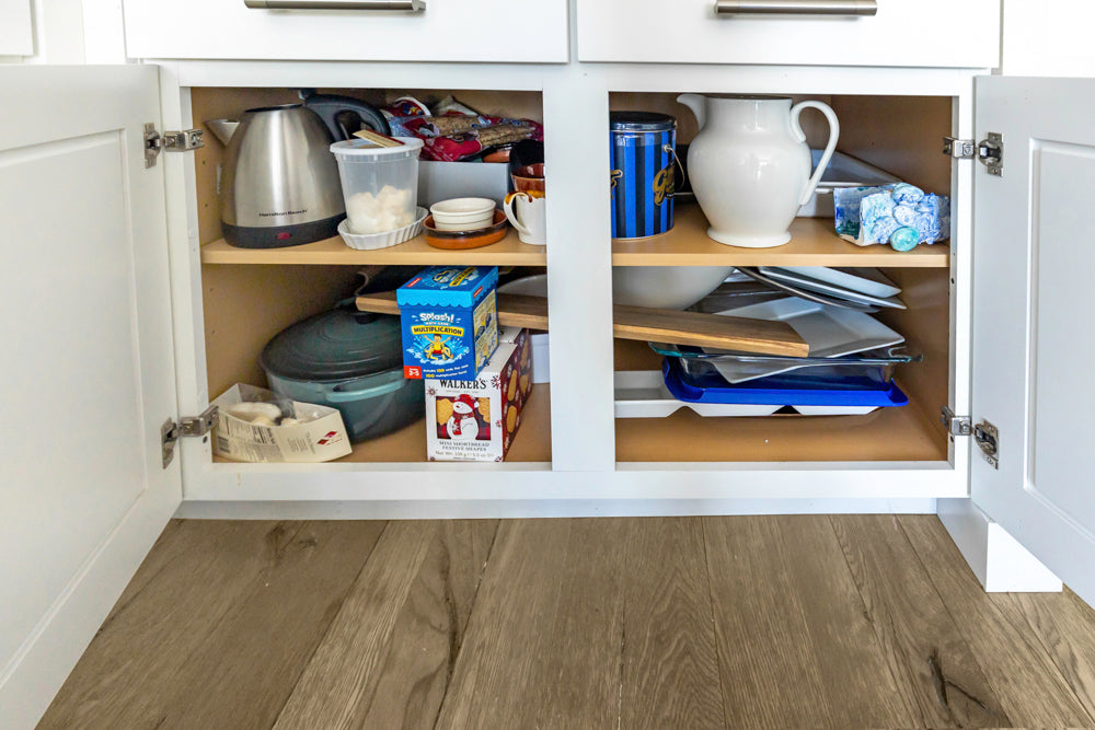 Transitional White Kitchen with Marble Waterfall Island and Thermador Appliances