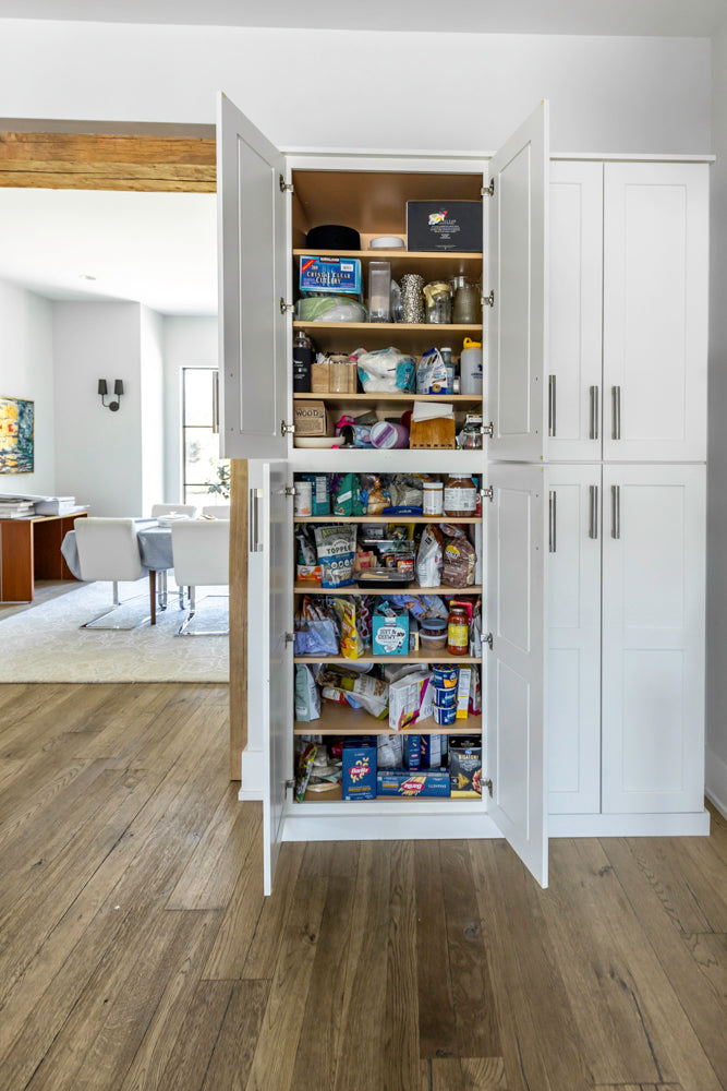 Transitional White Kitchen with Marble Waterfall Island and Thermador Appliances