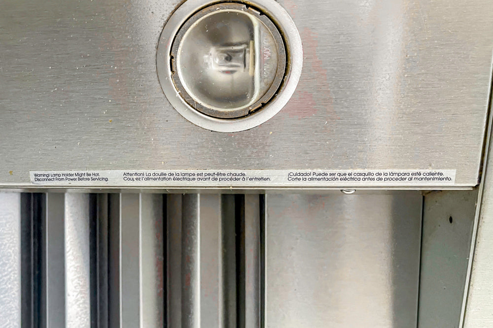 Transitional White Kitchen with Marble Waterfall Island and Thermador Appliances