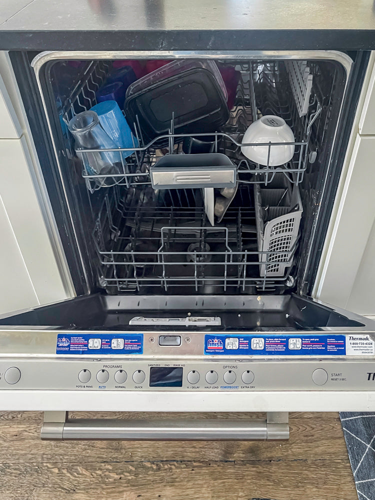 Transitional White Kitchen with Marble Waterfall Island and Thermador Appliances